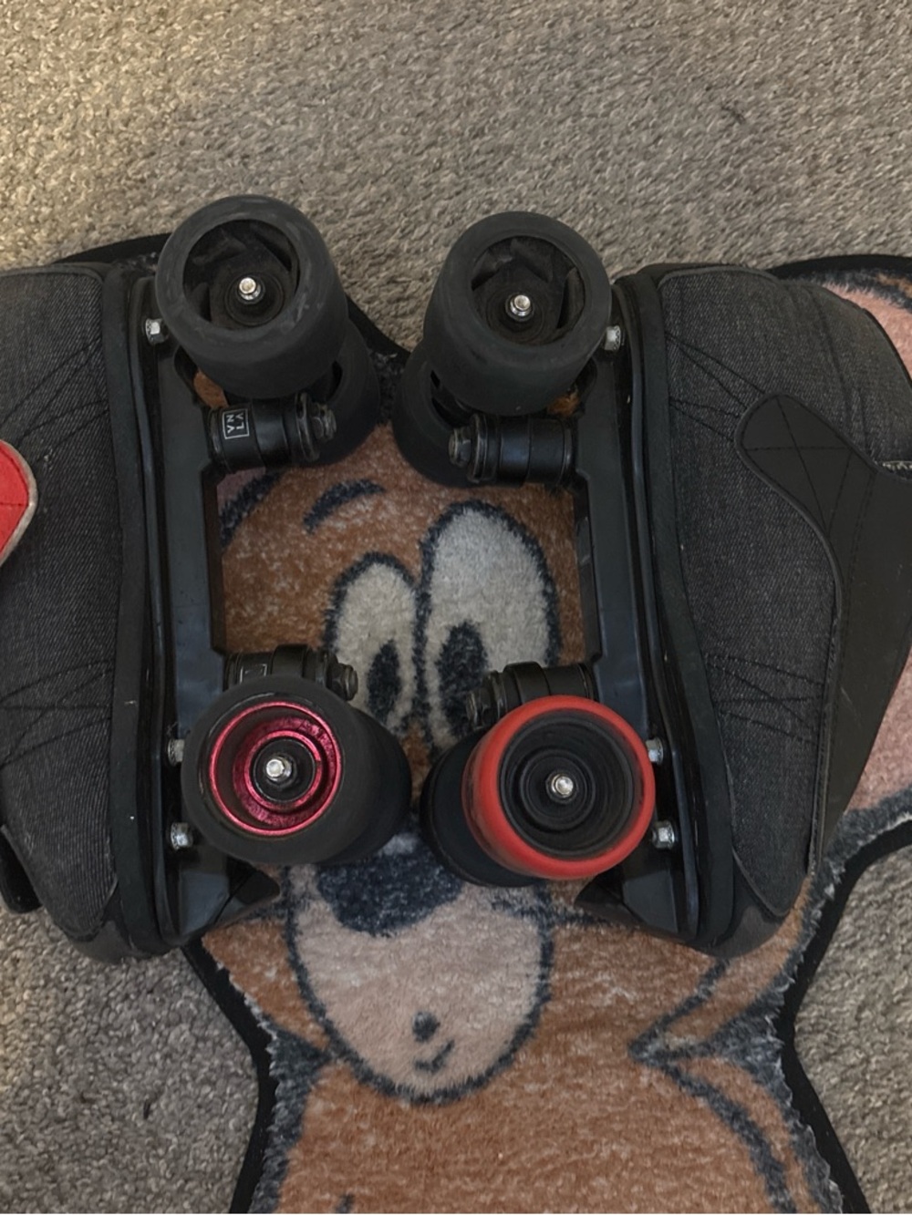 Men's Black Quad Roller Skates with Red Accent Wheels